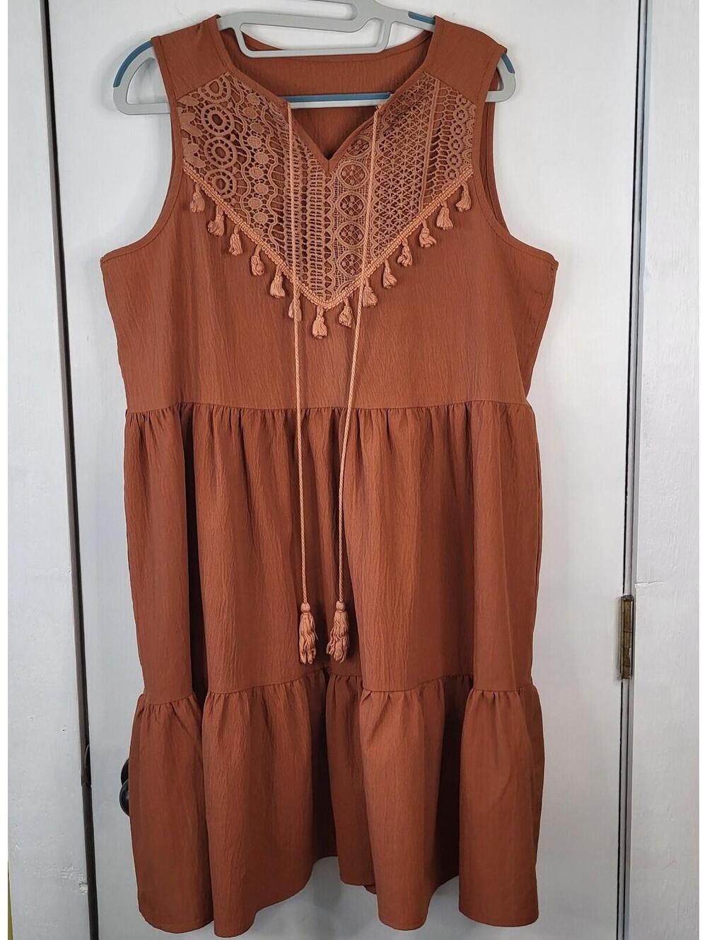 Tiered babydoll sleeveless dress tassel ties neckline crochet overlay on bodice